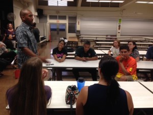 Junior AVID elective teacher Kenneth Patton addresses his students' families in the "Meet and Greet" portion of Parent Night.