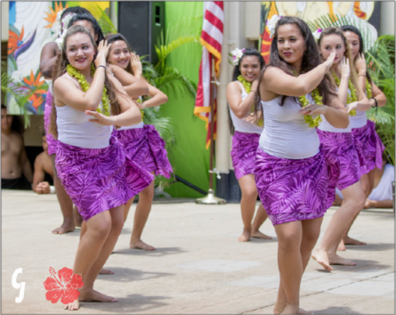 Ladies take to the stage and dance the hula auana, or modern hula. Kayce Demello (11), who participated in the hula and Tahitian dances, said, “I felt like a lot of people enjoyed it. Hopefully, we can put it out to a big assembly again.” (Photos by CJ Caraang)