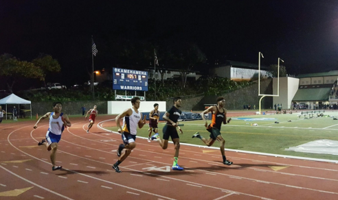 Soloman Loggins (12) seen running in the 4 by 4 boys team. The group took 1st place in the event, a massive victory for the track team.