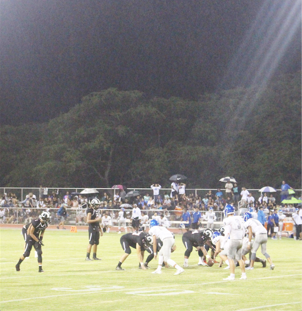 Radford+Rams+went+up+against+Moanalua+Menehunes+for+the+school%E2%80%99s+Homecoming+football+game.+Despite+the+team%E2%80%99s+losses%2C+Defensive+Back%2FWide+Receiver+Jonah+Soakai+%2812%29said+that+he+keeps+his+teammates+going+by+telling+them+to+stay+positive%2C+and+cheering+them+on+to+keep+their+momentum+going.+%E2%80%9COur+slogan+this+year+is+about+family%2C%E2%80%9D+he+said.+Photo+by+Alexa+Conrad