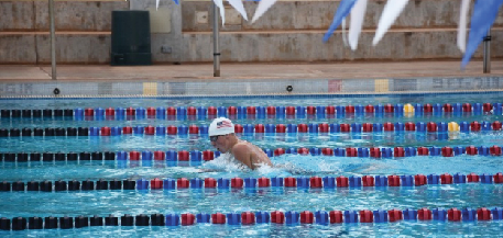 Nathaniel Gartner (11) puts in up to three hours a day, six days a week of swimming practices. Gartner began swimming competitively in seventh grade and continues to push himself to “drop some more time.” 