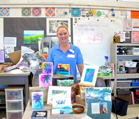 Jenny Floro, an Artist for HouseMart Ben Franklin Crafts presented her paintings in  Fine Arts teacher Susan Harrington’s room.