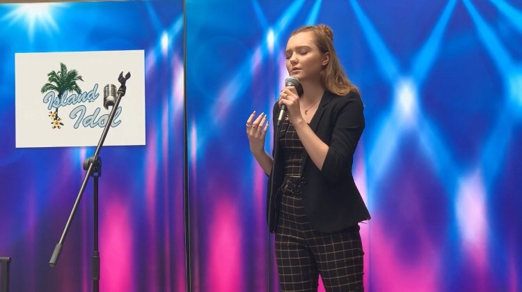 Mackenzie+Long+%2811%29+participated+in+her+second+year+of+Island+Idol%2C+both+times+leading+her+one+step+closer+to+American+Idol.+%E2%80%9CAmerican+Idol+is+a+tough+competition+with+a+lot+of+unique+voices+so+I+think+if+I+was+given+the+privilege+to+go+I+would+want+to+pick+a+song+that+not+only+shows+who+I+am+and+what+my+style+is+but+also+pick+a+song+that+makes+my+voice+stand+out%21%E2%80%9D+Long+said.