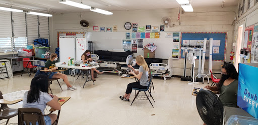 Students from HOSA sew up and create masks for students.