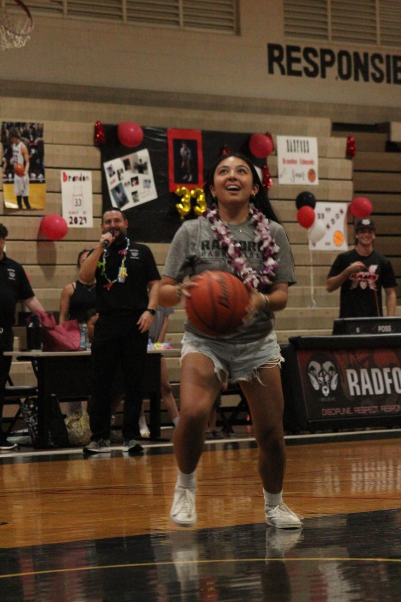 Kirsten Moore (12) shoots a shot after boy’s senior night at the Radford gym on Jan. 27. 