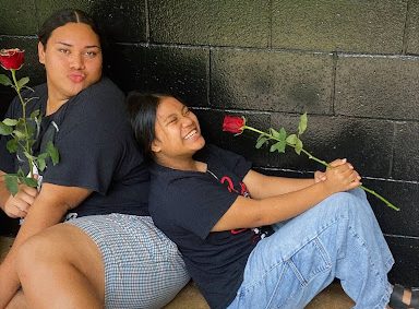 Senior Geraj Masaniai and sophomore Seagull Kabua spend Valentines Day sharing the gift of roses and smiles. (Photo Courtesy of Seagull Kabua)