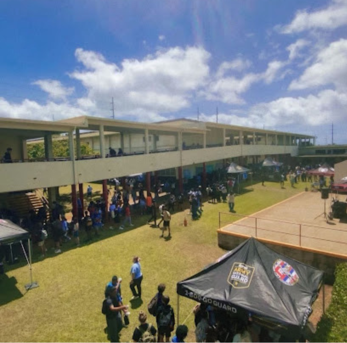 (Photo Credit: Seagull Kabua) AVID hosts the Blue Carnival with booths surrounding the center stage.