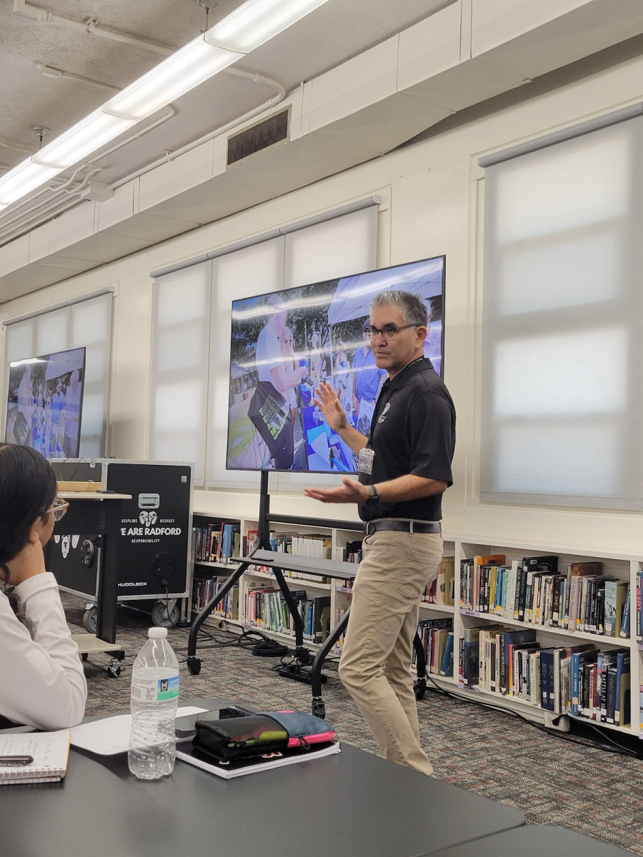 Sheldon Tawata, KCC Kuilei Outreach Program Coordinator talking to Radford students about opportunities at KCC.