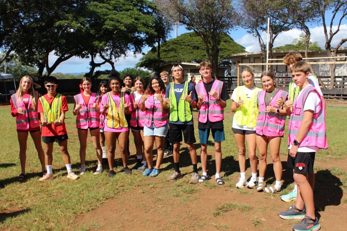 Students left to right: Alena  Stanley (11), Stephen Kozuma (11), Caitlin Fisher (11), Natalee Pin (9),  Naomi Haigler (12), Leonardo Zorola (9), Olivia Montalvo (9), Brandie Pahia-Obra (12), Gabriel Justice (9), Elias Bolanos (12), Calin Robertson (12), Brooklyn Weaver (10), Claire Yoakley (10), Maxwell Shelley (10), Robert Reed (10).